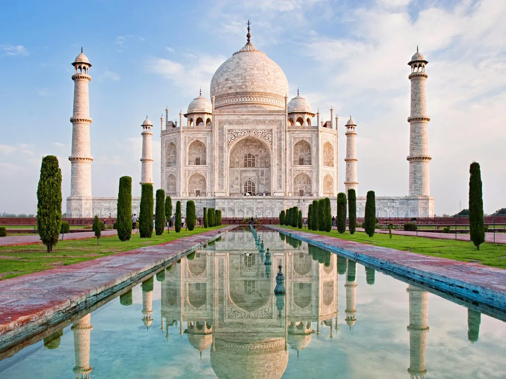 he Taj Mahal is one of the most iconic and breathtaking structures in the world. Located in Agra, India, the Taj Mahal is a stunning example of Mughal architecture and has become an enduring symbol of love